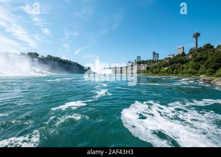 A view of the Niagara Falls from the maid of the mist. Stock Photo