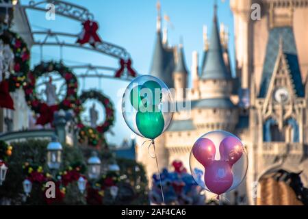 Orlando, Florida. December 05, 2019 . Top view of Mickey balloons on Cinderella Castle background  at Magic Kingdom Stock Photo