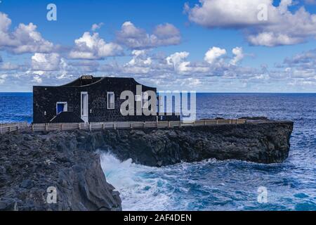 La Frontera, El Hierro/Spain; April 3 2019: Punta grande hotel, on volcanic rocks coastline, with Atlantic ocean background, El Hierro, Canary islands Stock Photo