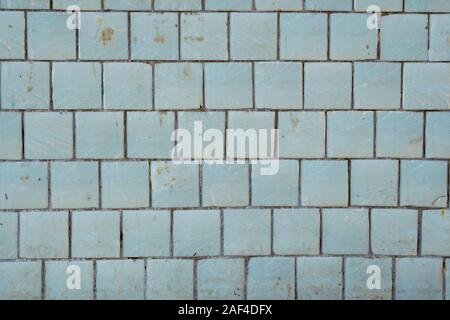 Blue tiles on a wall as a background image. Stock Photo