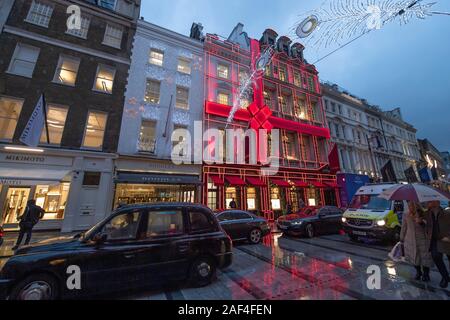 Mayfair, London, UK. 12th December 2019. Christmas decorated shops in