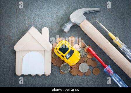 Home and home repair tools on a black background Real estate concept New home concept Stock Photo