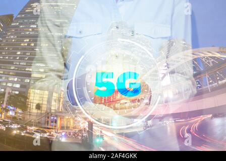 Telecommunications network over the city, smart wireless Internet technology for 5G smart phones Stock Photo