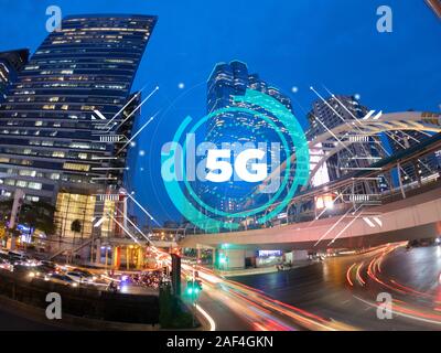 Telecommunications network over the city, smart wireless Internet technology for 5G smart phones Stock Photo