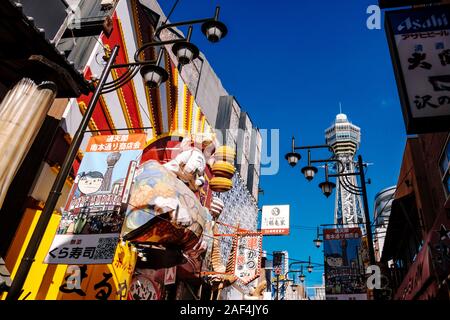 Restaurants and stores along with Tsutenkaku Tower in Shinsekai district, Osaka/Japan Stock Photo