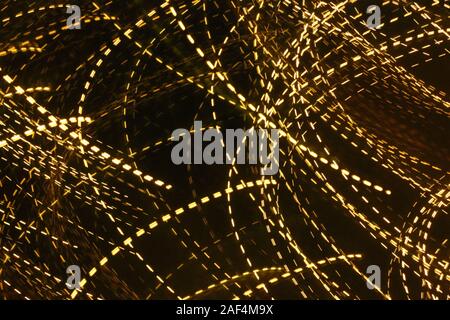 Yellow light trails in curves Stock Photo