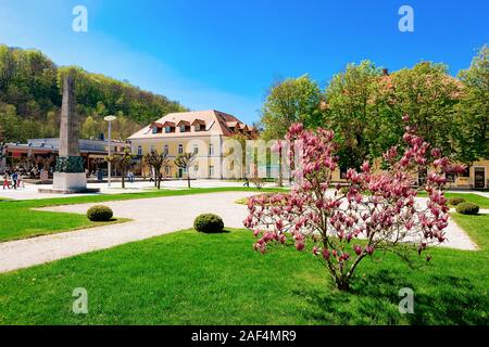 People at park with street lights in Rogaska Slatina Stock Photo