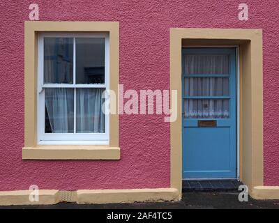 pink house with blue door in Kirkcudbright, Dumfries & Galloway,Scotland, UK Stock Photo