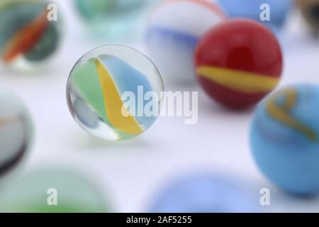 Marbles in a white box Stock Photo