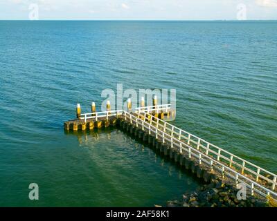 Jetty at the Ijsselmeer on the Afsluitdijk A7, the Netherlands. Stock Photo