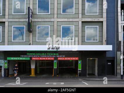 Shot from across the street,entry and structural detail of car parking garage. Stock Photo