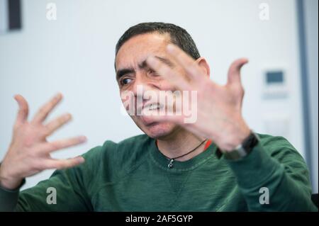 Mainz, Germany. 27th Nov, 2019. Ugur Sahin, CEO BioNTech, gesticulated during the interview. BioNTech is a biotechnology company focused on developing and manufacturing a patient-specific approach for the treatment of cancer and other serious diseases. Credit: Andreas Arnold/dpa/Alamy Live News Stock Photo