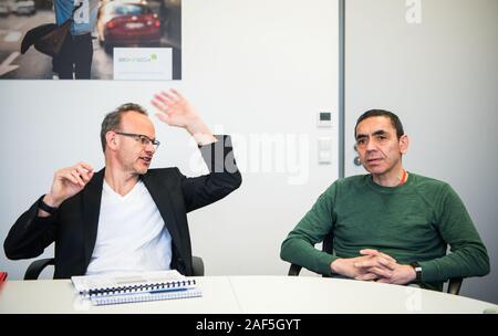 Mainz, Germany. 27th Nov, 2019. Sean Marett (l), CFO BioNTech, and Ugur Sahin, CEO BioNTech, sit next to each other during the interview. BioNTech is a biotechnology company focused on developing and manufacturing a patient-specific approach for the treatment of cancer and other serious diseases. Credit: Andreas Arnold/dpa/Alamy Live News Stock Photo