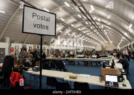 London, Britain. 12th Dec, 2019. Staff count ballots for the general election at Brunel University in Uxbridge, London, Britain, Dec. 12, 2019. An exit poll published after voting closed in the British election on Thursday night suggested the Conservatives are on course to win a massive Parliamentary majority. Credit: Ray Tang/Xinhua/Alamy Live News Stock Photo