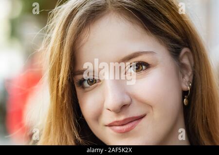 Closeup of a teenage girl, blonde hair, outdoors. Stock Photo