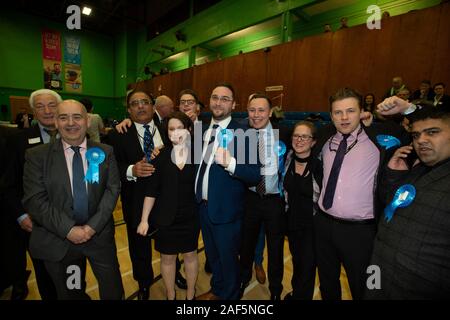 Bury, UK. 13th December 2019. Conservative candidate Christian Wakeford celebrates his win as the results are announced for the UK election 2019 for the parliamentary constituency of Bury South, held at Castle Leisure Centre. Credit: Russell Hart/Alamy Live News Stock Photo