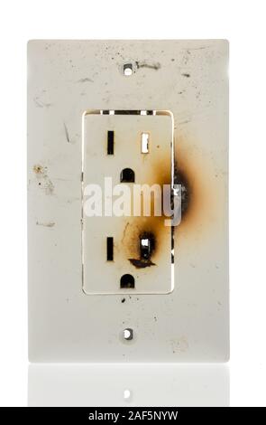 Burnt electrical outlet Stock Photo - Alamy