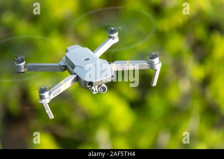 Sochi - Russian Feseration - May 06, 2019 - DJI Mavic Pro Platinum drone flying in the sky, view from above.. Modern compact drone with obstacle avoid Stock Photo