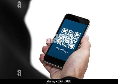 QR code scanning payment and verification. Businessman holding mobile smart phone scan QR code Stock Photo