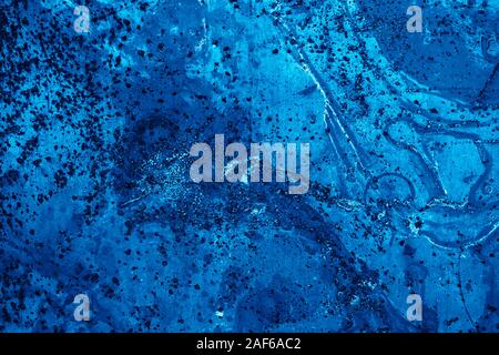Abstract marble background. Backdrop in blue colors. Texture of marble surface great for design. The main color trend of 2020 year. Stock Photo