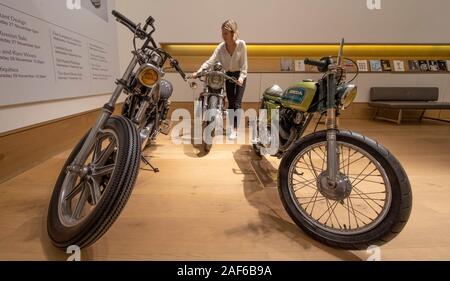 Bonhams, London, UK. 12th December 2019. (EMBARGOED till 13th December 2019). Modern & Contemporary Art sale preview includes a trio of custom motorcycles by pioneering street artist D*Face. Image (left to right): D*Face, Spoiled Brat 2014, estimate £5,000-7,000; First Born 2012, estimate £10,000-15,000; Green Terror 2015, estimate £2,800-3,500. Personally customised by globally renowned street artist D*Face, these three exceptional motorcycles are evocative symbols of the defiance and daring that has characterised D*Face's practice since his emergence in the early 2000s. The sale takes place Stock Photo