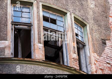 ruins of an old house in vintage style-Windows and stone patterned wall. Stock Photo