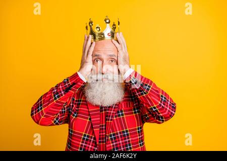 My precious. Photo of cool look grandpa white beard aged king holding diadem don't want give it to young prince wear crown red blazer tie outfit Stock Photo