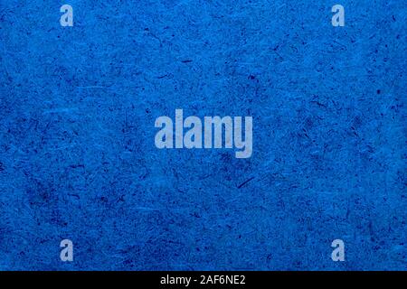 Plywood texture. Oriented strand board. OSB background. Color of the Year 2020 Classic Blue Stock Photo