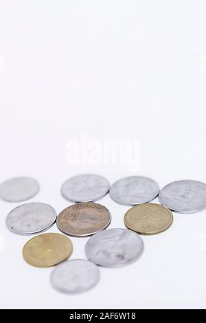 Image of Indian currency and coins on white background