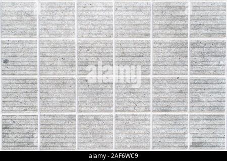 dirty white concrete wall tile with 24 squares in rectangular form Stock Photo