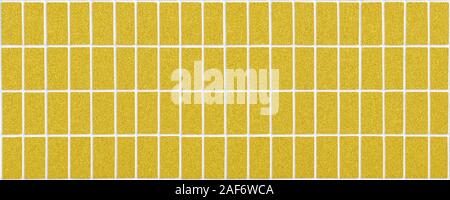 golden ceramic tile with many vertical rectangles in wide screen form with white filling Stock Photo