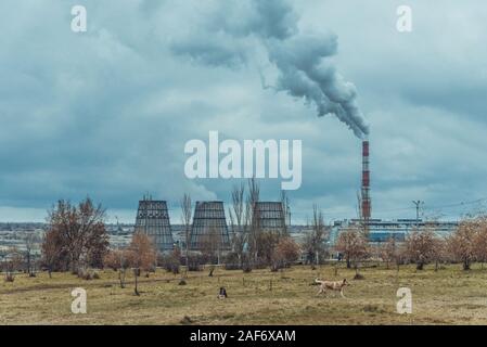 of large pipes belching smoke from thermal power plants Stock Photo