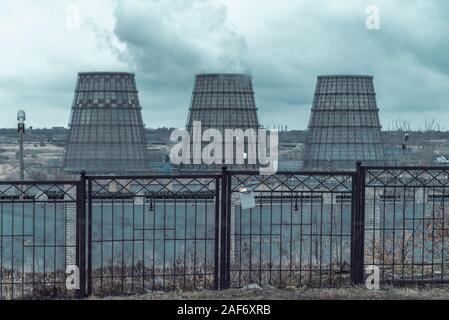 of large pipes belching smoke from thermal power plants Stock Photo