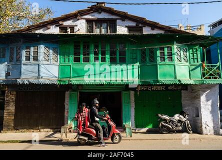 An old vintage house made of wood and stone with traditional architecture and sloping roofs in the Himalayan hill station of Almora. Stock Photo