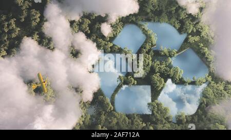 Eco friendly waste management concept. Recyclyling sign in a lake shape in the middle of dense amazonian rainforest vegetation viewed from high above Stock Photo