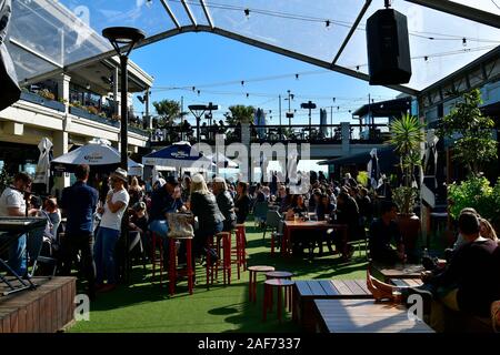 Melbourne, VIC, Australia - November 04, 2017: Crowd of people in courtyard of public Republica restaurant a preferred meeting place for drink and mus Stock Photo