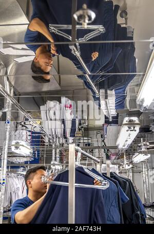 View into the laundry room of the cruise ship Mein Schiff 1. According to the hotel manager, 2 to 4 tons of bed linen, towels, tablecloths etc. are washed daily in the laundry. On embarkation days the quantity increases to 12 to 14 tons. (14 Sept 2019) | usage worldwide Stock Photo