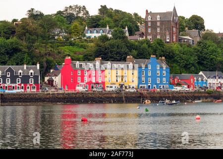 Colourful houses on the harbour at Tobermory on the Isle of Mull a popular tourist destination in Scotland and used in the BBC TV series Balamory Stock Photo