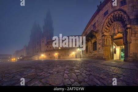 Santiago de Compostela, Spain. View of Praza do Obradoiro square in front of Cathedral with strong morning fog Stock Photo