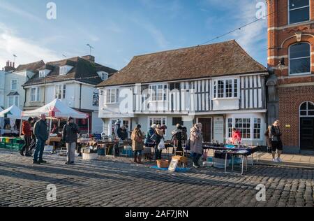 Market stalls in the medieval market town of  Faversham, Kent, UK Stock Photo