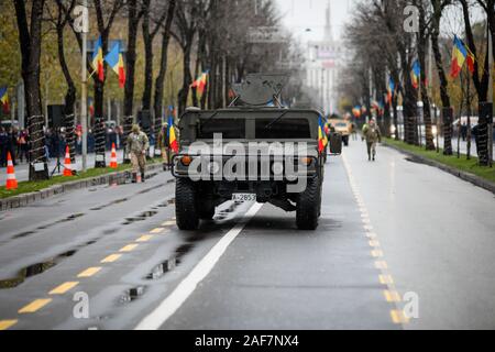 Bucharest, Romania - December 01, 2019: Romanian Army High Mobility Multipurpose Wheeled Vehicle (HMMWV, colloquial Humvee) at the Romanian National D Stock Photo