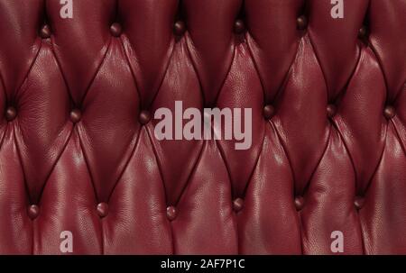 Dark burgundy cherry red upholstery pattern background Stock Photo