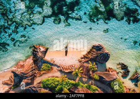 Anse Source D argent beautiful famous beach at La Digue Island, Seychelles. Aerial drone top down photo from above perspective