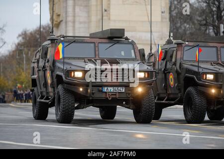 BUCHAREST, ROMANIA - December 1, 2019: URO VAMTAC combat armored vehicles at Romanian National Day military parade. Stock Photo