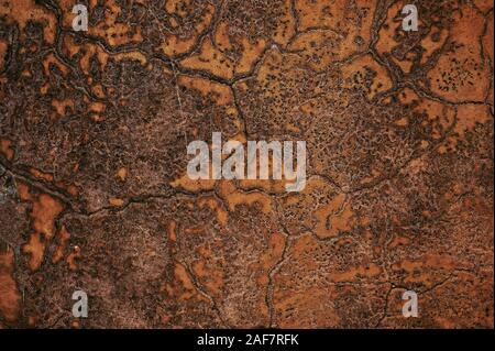 Red and Orange antique Stone Texture with dent and scratches. Stone Texture of medieval fortress wall or floor Stock Photo