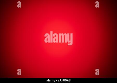 red blurred background with strong black gradient and vignette. Stock Photo