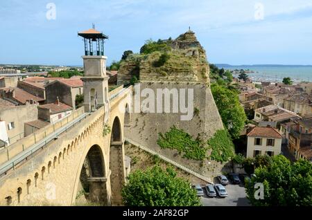 View over Historic Aqueduct, the Pont de l'Horloge, & Village of Saint Chamas or Saint-Chamas on the Shores of Etang de Berre Lake Provence France Stock Photo
