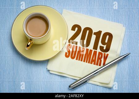 2019 year summary text on a napkin with a cup of coffee, end of year business concept Stock Photo