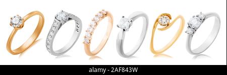 Collection of engagement rings in yellow and white gold with precious stones isolated on background. Photos made by stacking Stock Photo