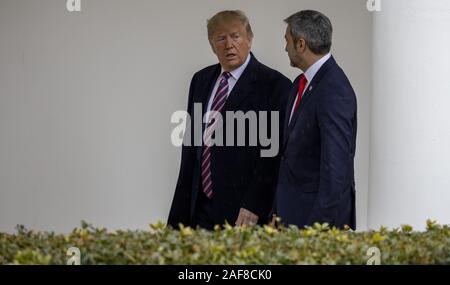 Washington DC, USA. 13th Dec, 2019. President Donald Trump and Paraguay President Mario Abdo Benitez walk to the Oval Office at the White House in Washington, DC on Friday, December 13, 2019. Photo by Tasos Katopodis/UPI Credit: UPI/Alamy Live News Stock Photo